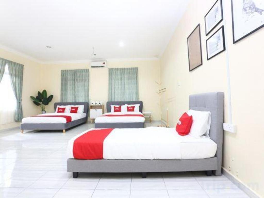 โอโย 89607 อโลฮา ชาเลต์ Hotel Kampung Raja ภายนอก รูปภาพ